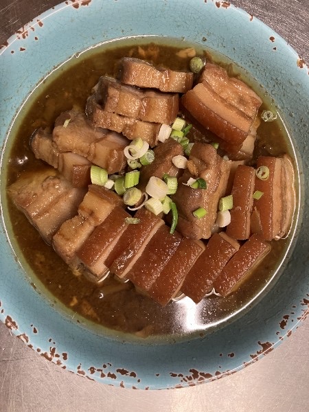 Braised pork belly in savory broth